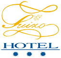 H El Suizo Logo
